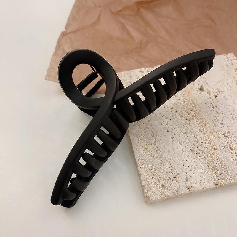Durable hair claw clip in action holding hair