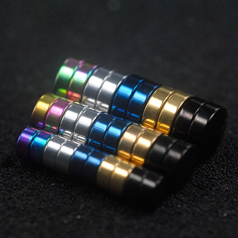 Titanium cross earrings with zirconia inlay
