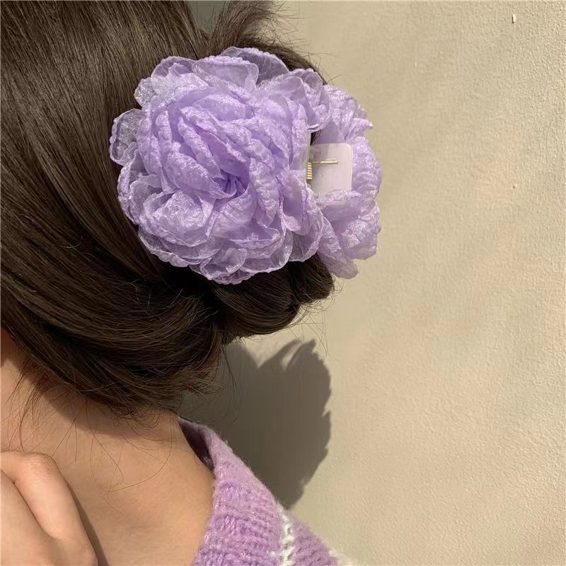 floral hair clip styled for an updo