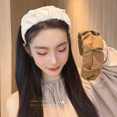 Stylish wrinkled wide hairband on model