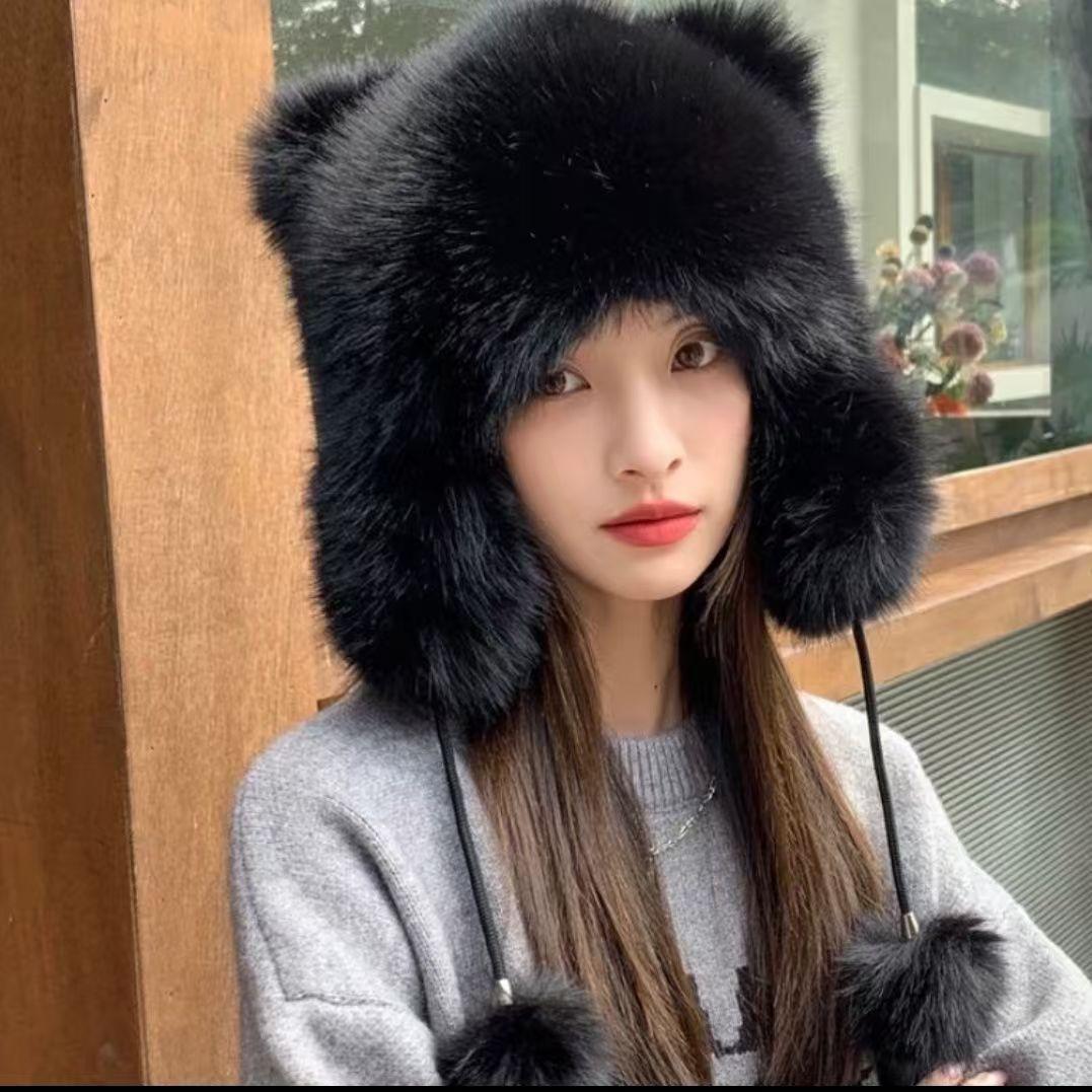 Cute plush winter hat with bear ears on model