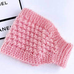 Stylish knitted ear warmer in black colour