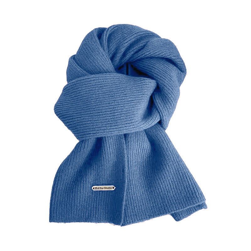 Fashionable blue knitted scarf for winter outfits