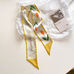 model wearing yellow floral scarf in spring