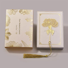 Premium metal bookmark on an open book