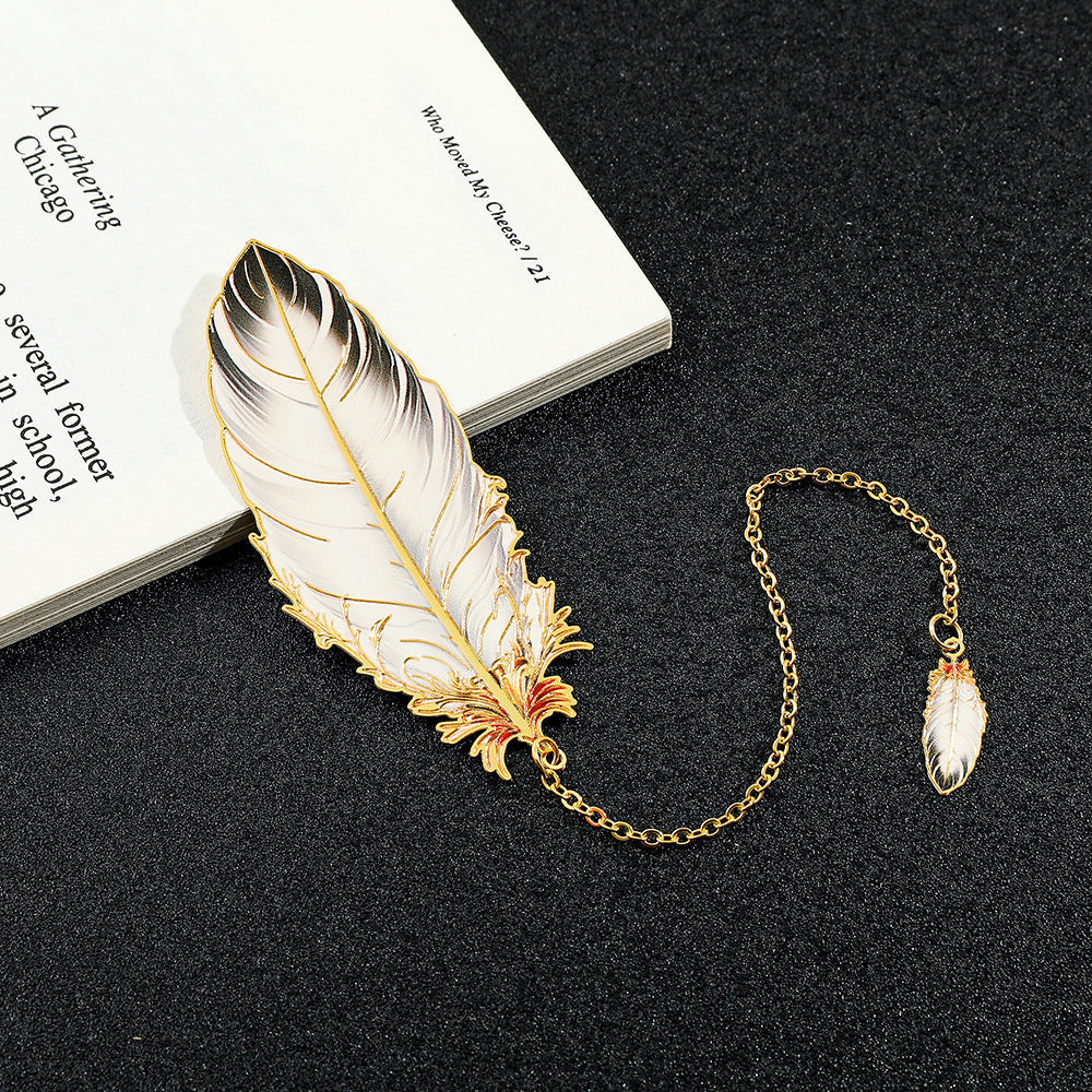 metal bookmark with dangle resting on table image 9